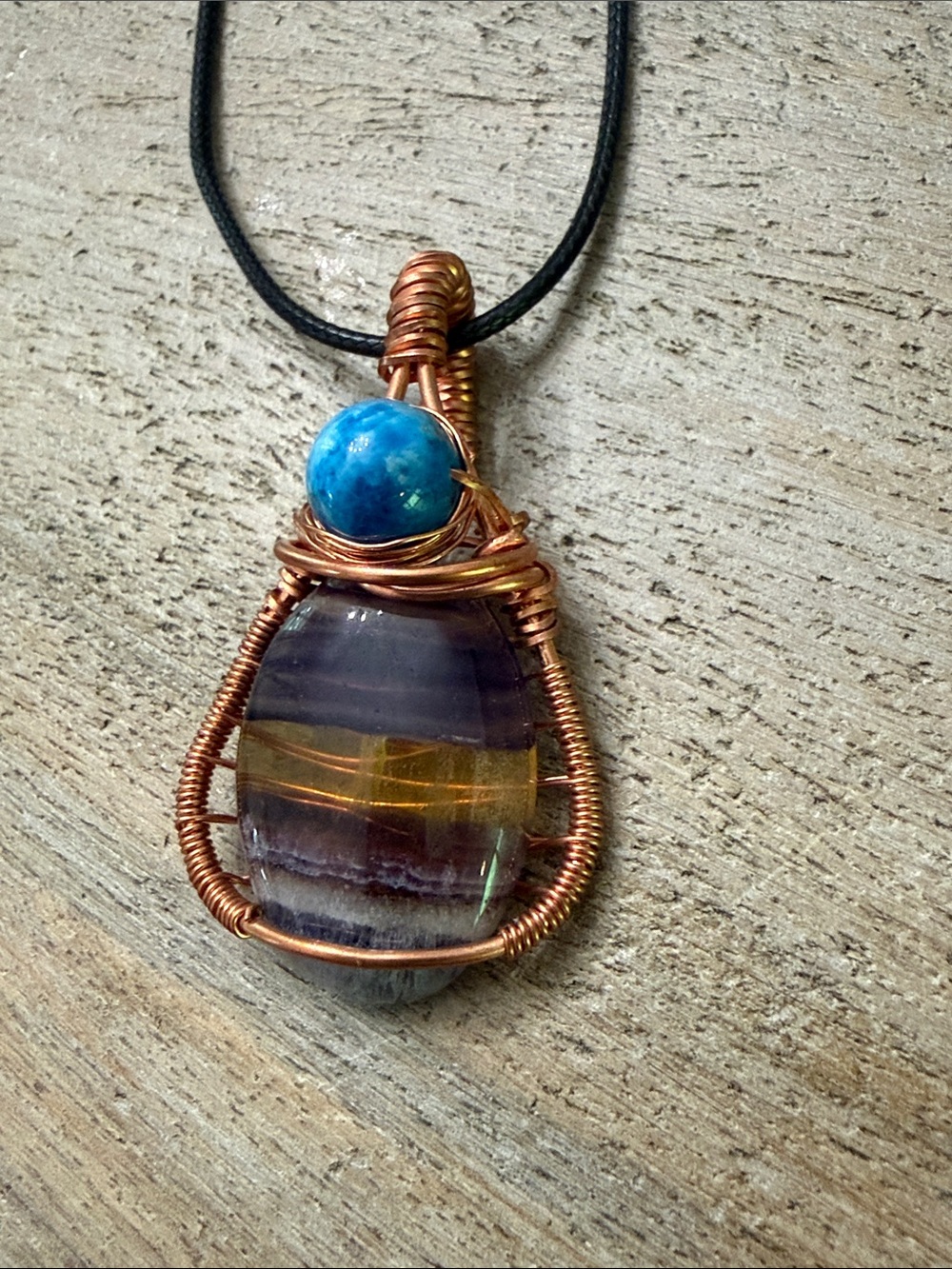 Handmade Copper Wire Wrapped Fluorite Pendant with Blue Apatite Bead